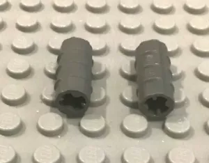 LEGO 2 Dark GrayTechnic, Axle Connector 2L (Ridged with x Hole x Orientation) - Picture 1 of 1