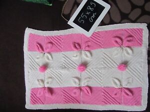 Beautiful hand knitted pink and white pram/cot/crib blanket 