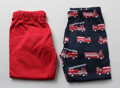 Paquete de 2 pantalones de camión de bomberos The Children's Place AC2 rojo/azul talla 3-6M  Foto 1 de 4