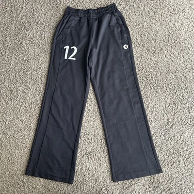 Pantalones deportivos Vuori Performance bordados XSmall negros de pierna ancha elásticos para mujer Foto 1 de 4