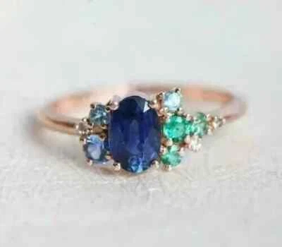 Anillo de boda para mujer con diamantes azules ovalados de zafiro creado en laboratorio enchapado en oro rosa de 14 quilates Foto 1 de 4