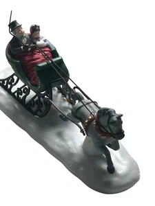 Estatuilla Dept 56 Heritage Village paseo en trineo porcelana pintada a mano Navidad - Imagen 1 de 10