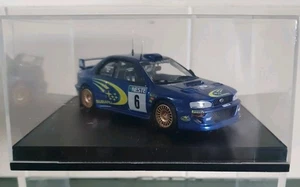 TROFEU SUBARU IMPREZA WRC 99 1ST 1000 LAKES 99 DIE-CAST MODEL RALLY CAR 1114 MIB - Picture 1 of 16