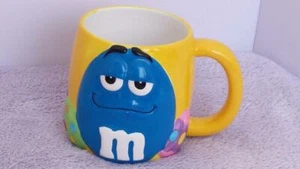 M&Ms Easter Eggs Cup Coffee Mug Blue Mars Candy Yellow Collectible 17 Yrs Old - Picture 1 of 1