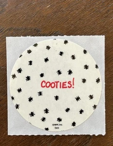 Vintage 80er Cooties Aufkleber RPP Inc. Dale lustig Humor albern unbenutzt - Bild 1 von 4