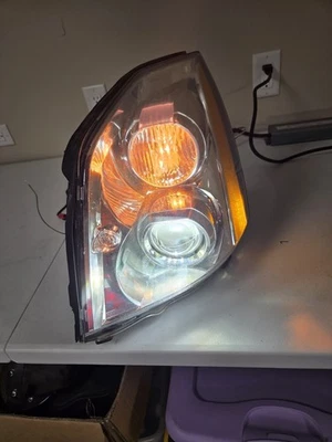 Faro lado conductor Cadillac DTS LH 2006-2011 HID xenón (GM387-B001L) Foto 1 de 4