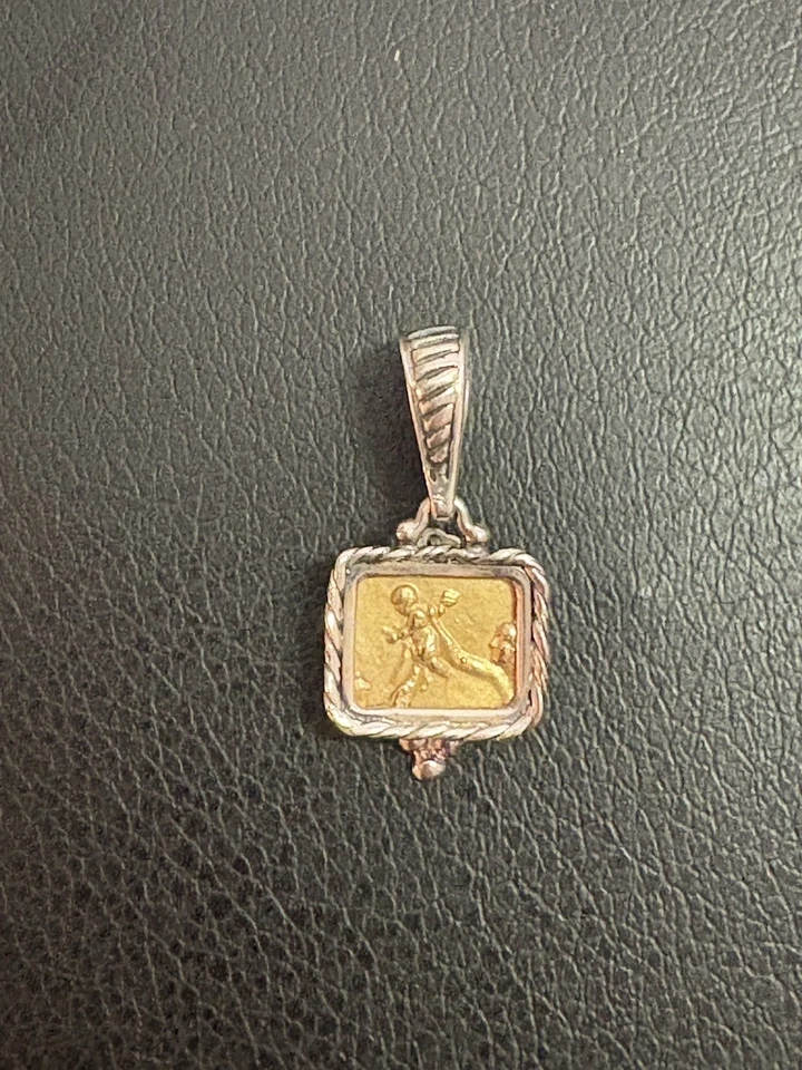 COLGANTE TAGLIAMONTE ORO AMARILLO Y PLATA 14K  Foto 1 de 4