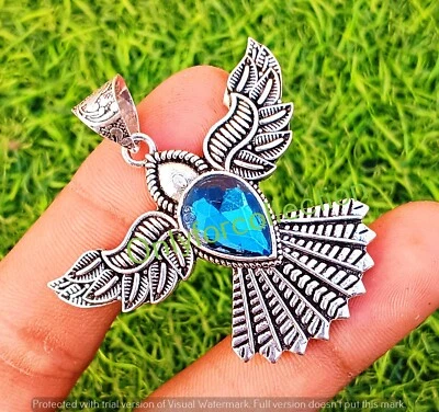 Colgante de piedras preciosas de topacio azul cielo para mujer enchapado en plata de ley 925 joyería de águila Foto 1 de 4