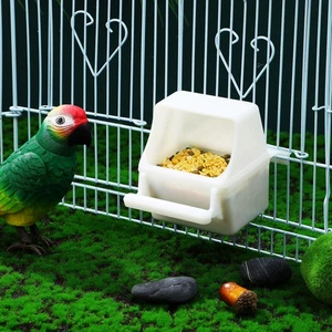 Caja de comida a prueba de salpicaduras 2 piezas comedero para loros mascotas pájaro pequeño taza de plástico jaula plato - Imagen 1 de 10