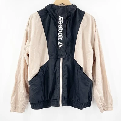 Chaqueta cortavientos REEBOK para mujer talla grande cremallera enfoque pista bolsillo atletismo Foto 1 de 4