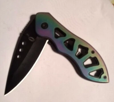 Carpeta Steel Tech 4 1/2" acero inoxidable con arco iris titanio aluminio *OFERTA* Foto 1 de 4