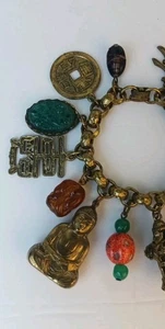 Vintage ART goldfarbenes klobiges Buddha-Bettelarmband mit asiatischem Motiv - Bild 1 von 6