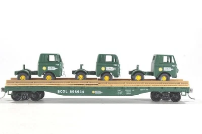 HO Tyco Cust BC Rail 50ft Flat Car BC Rail Semi-Tractors Athearn Trucks KD Cplrs - Image 1 of 4