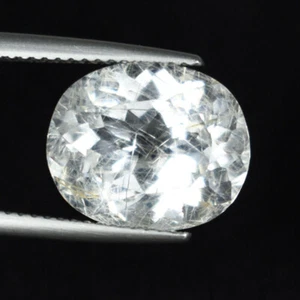 5.68 ct SPARKLING RARE HUE" RUTILE COLORLESS NATURAL PHENAKITE OVAL See Vdo SPL - Picture 1 of 2