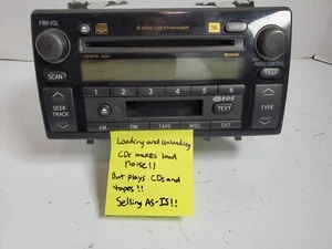 AS-IS OEM Toyota 86120-AA210 6 Disc CD / Cassette Tape Player Double DIN Stereo - Picture 1 of 17