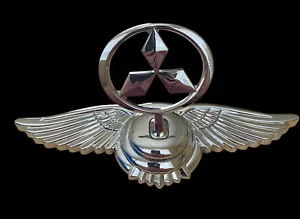 Mitsubishi flying eagle logo hood ornament silver toned new in package - Bild 1 von 9