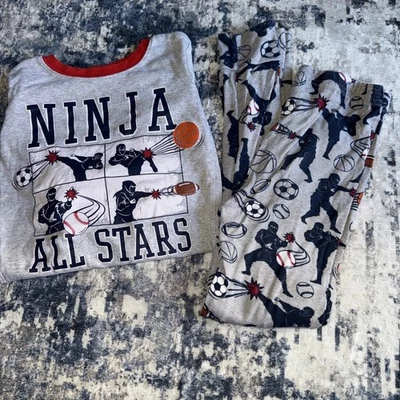 Juego de 2 piezas de pijama de lugar ninja deportivo ajustado talla 8 para niños Foto 1 de 4