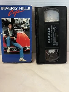 VHS Tapes: 2 PK Beverly Hills Cop (Eddie Murphy) & Liar Liar (Jim Carrey) - Picture 1 of 3