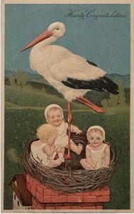 Neu Baby Postkarte Storch Herzliche Glückwünsche " Baby in Krippe unbesendet - Bild 1 von 2
