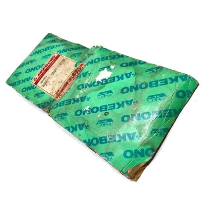 Pastilhas de freio a disco dianteiro Akebono A-100WK adequadas para Isuzu KB Pickup KBD21 26 41 NOS - Imagem 1 de 4