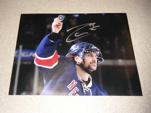NY RANGERS SIGNED 11X14 MATT ZUCCARELLO HOLDING UP GAME PUCK - Picture 1 of 1