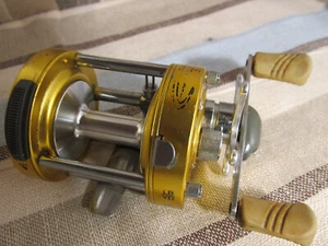 Bass Pro Shop Mega Cast Baitcast reels MCM2000 MCM 2000 -Works Good-Used - Picture 1 of 8