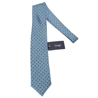 Corbata Drake's nueva con etiquetas en azul claro/naranja/blanco patrón geométrico 100 % seda Foto 1 de 4