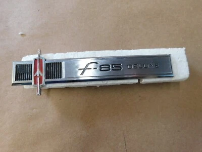 NOS OEM Oldsmobile 1965 Cutlass F85 Deluxe Dash Emblem Ornament Trim - Image 1 of 4