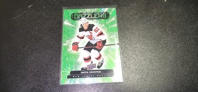 817: 2022-23 Upper Deck Series 2 Green Dazzlers - #DZ-59 Nikita Okhotiuk (RC) - Image 1 of 4
