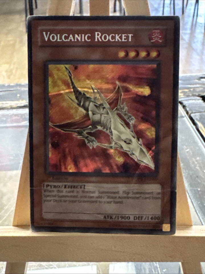 Yugioh *Volcanic Rocket X1 Secret Rare 1st Edition* (DMG) FOTB-EN000 - Image 1 of 2