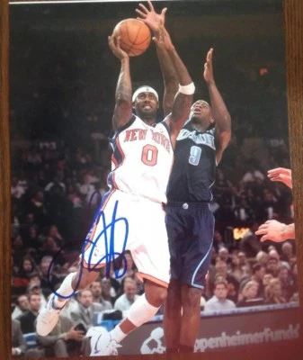 Foto 8x10 firmada a mano por Larry Hughes de los New York Knicks  Foto 1 de 2