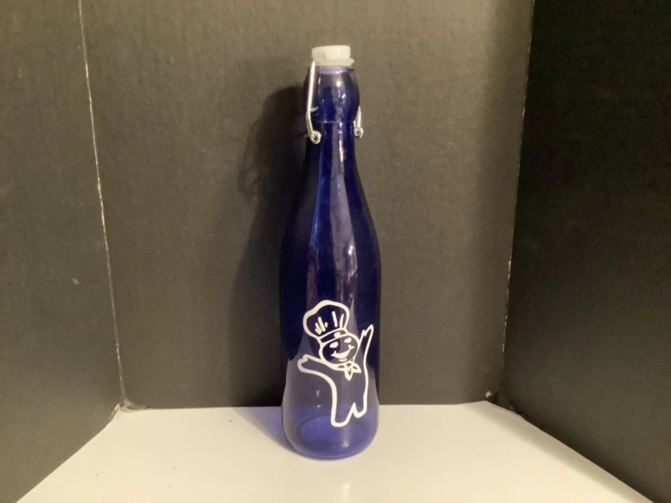 Pillsbury Doughboy Blue Glass Capped Bottle - Image 1 of 1