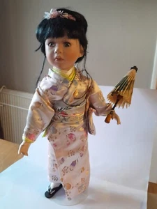 Japanese Porcelain Doll, Kimono Outfit carrying an umbrella - Picture 1 of 3