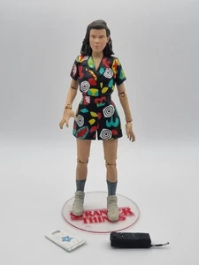 McFarlane Toys Stranger Things Season 3 7" Eleven Star Court Mall Figur, lose  - Bild 1 von 5