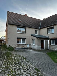 Haus mit Grundstück - Bild 1 von 9