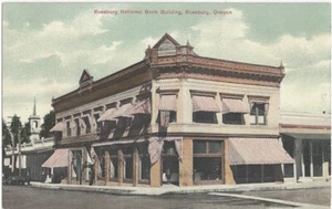1909 Roseburg, Oregon - National Bank & Street Scene - Vintage Postcard - Imagen 1 de 2