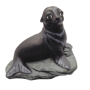 Figura de cerámica de león marino negro mate artesanal artesanal de sello sobre roca 1982 - Imagen 1 de 24