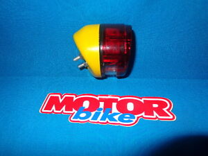 Ossa tr 80 taillight trial , in yellow, the base is fiber.