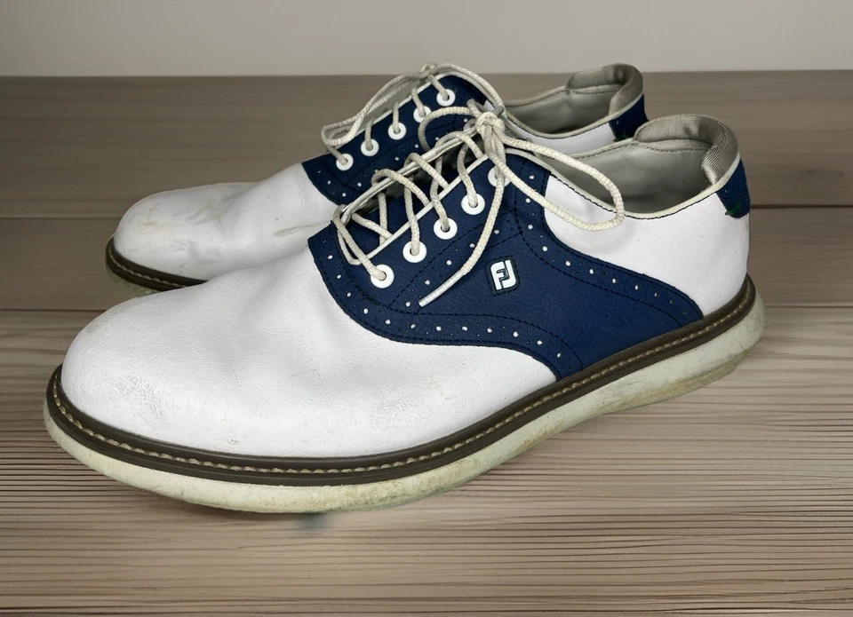 Zapato de golf FootJoy FJ Traditions para hombre 10,5 M 57901 púas de cuero azul blanco Foto 1 de 4