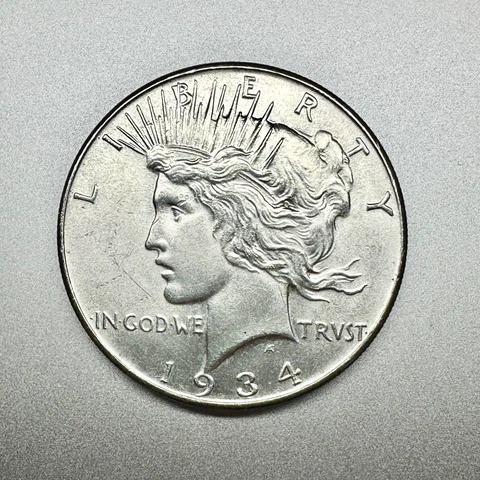 1934  PEACE DOLLAR    UNCIRCULATED DETAILS   BETTER DATE  #3412 Cover