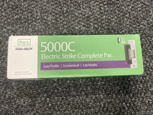 ASSA ABLOY HES Colpo Elettrico 5000C-12/24D-630 Nuovo Sigillato Scatola Cilindrica - Foto 1 di 2