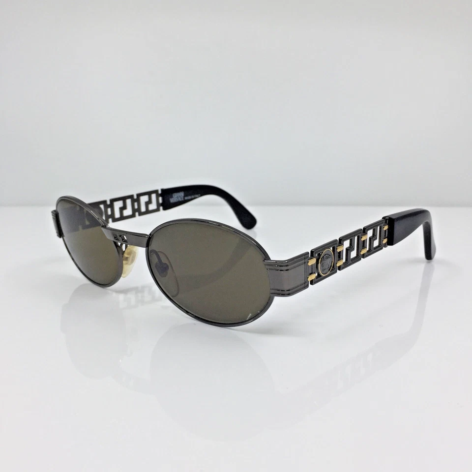 Gafas de sol Gianni Versace S43 de colección raras M. S43 Col. 91M Gunmetal y dorado Italia Foto 1 de 4