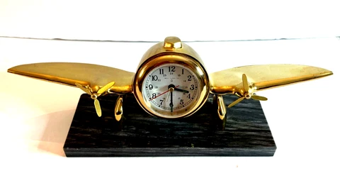 VTG. SOLID BRASS ART DECO AERO PLANE BELL CLOCK AIRPLANE ON MARBLE BASE, Felt Cover