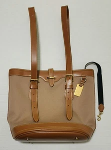 Auténtico bolso de mano Dooney & Bourke para mujer de lona de cuero con correas ajustables - Imagen 1 de 22