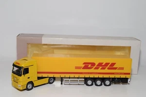 A88 1:50 NZG N.Z.G. Camión Mercedes-Benz Actros 555 con remolque DHL VNMIB - Imagen 1 de 18