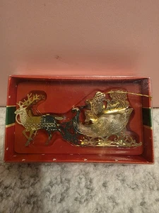 Adorno de reno trineo de Papá Noel vintage 3D troquelado latón - Imagen 1 de 19