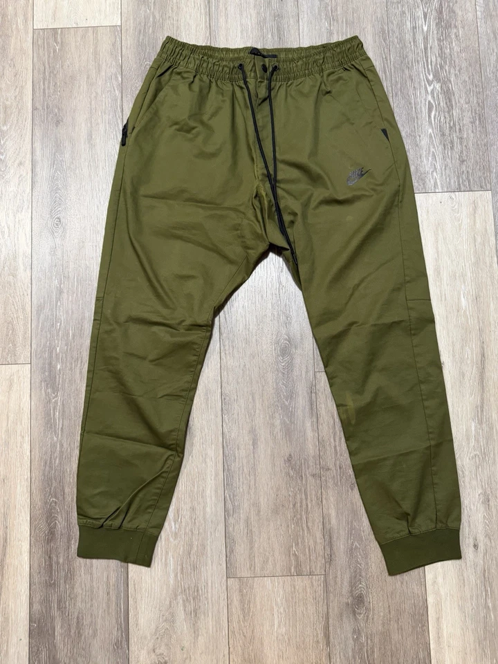 Pantalones de cercanías Nike para hombre ropa deportiva tejidos tecnológicos, verde oliva talla grande Foto 1 de 4