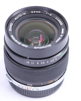Como nuevo- Late Olympus Zuiko mc f2 24mm Auto-W OM Japón 24/2 lente envío... - Imagen 1 de 4