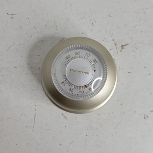 Honeywell Il Termostato Rotondo Calore e Freddo Oro Non Programmabile da Parete - Foto 1 di 4
