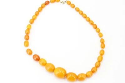 BERNSTEINKETTE Oliven baltisch 47,77 g Länge 52 cm Ø bis 22,8 mm Butterscotch - Bild 1 von 4